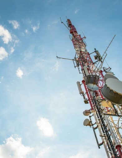 Low angle shot of cellular base station against a sky background